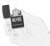 AC/DC® Back In Black windproof lighter with its lid open and lit