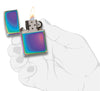 Classic Multi Color Windproof Lighter lit in hand