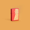 Lifestyle image of Year of the Rabbit Red Matte Windproof Lighter standing in an orange background.