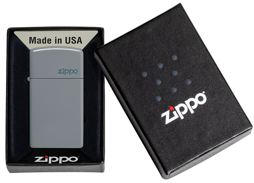 Zippo Slim Flat Grey Zippo Logo Pocket Lighter in its packaging.