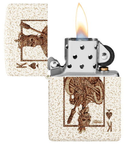Zippo Rick Rietveld Ace Skull Design Mercury Glass Windproof Lighter with its lid open and lit.