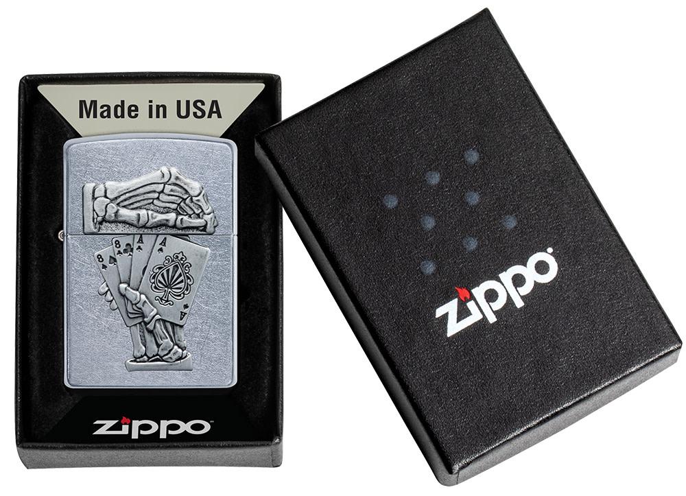 Dead Mans Hand Surprise Emblem Design Street Chrome™ Windproof Lighter in its packaging