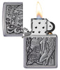Skull and Angel Emblem Design Street Chrome™ Windproof Lighter with its lid open and lit