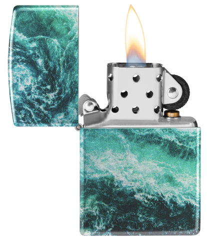 Zippo Rogue Wave Design 540 Fusion Windproof Lighter with its lid open and lit.