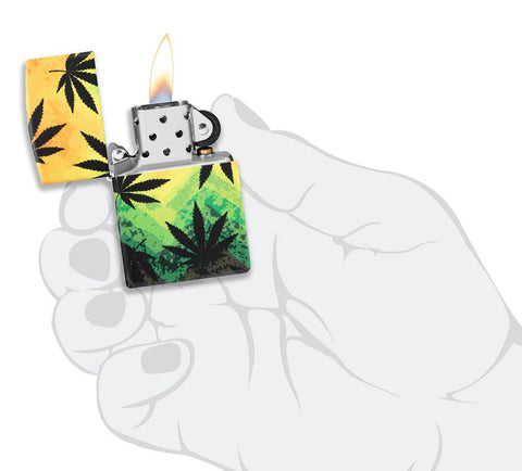 Cannabis Design 540 Color Windproof Lighter lit in hand.